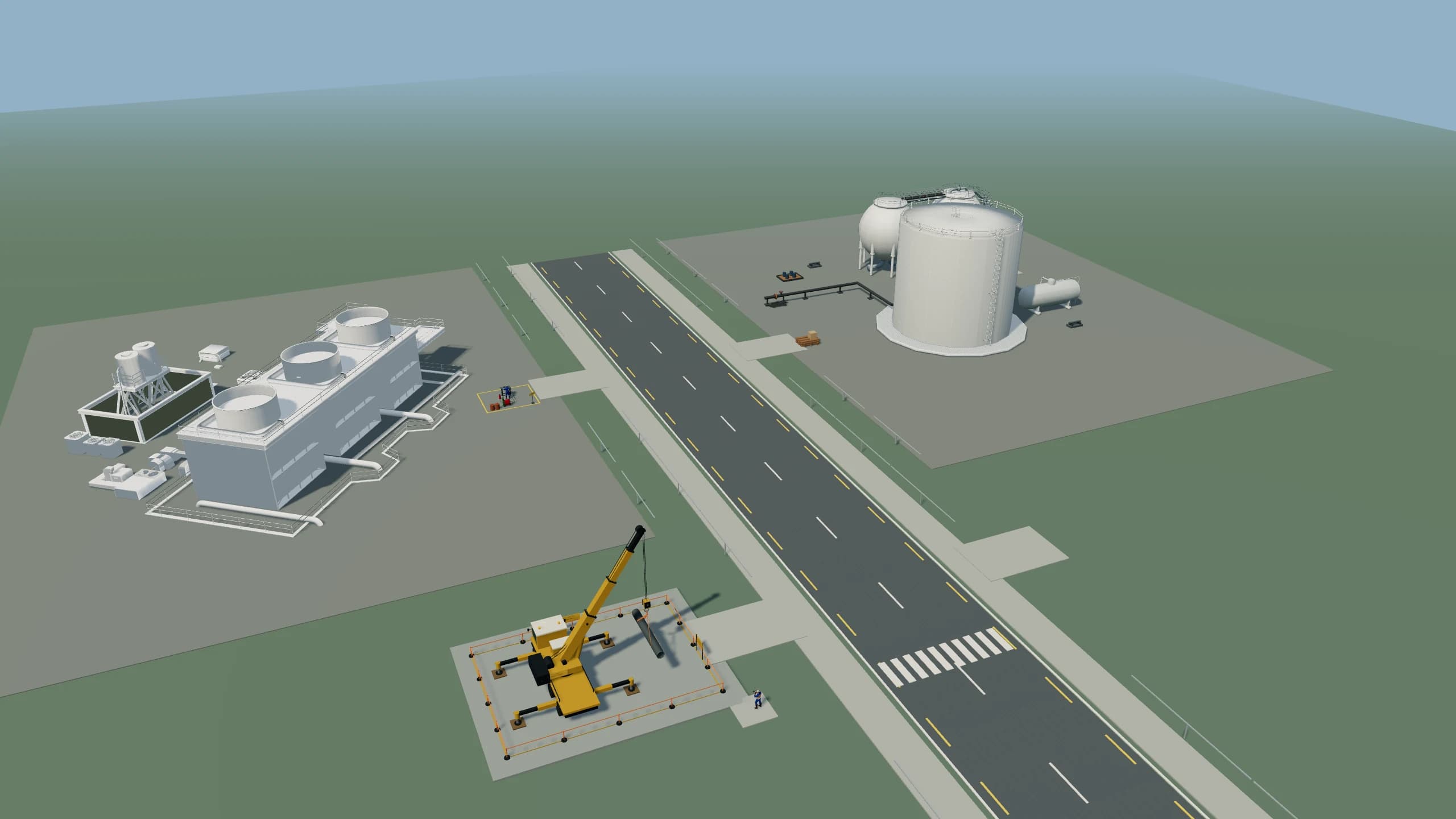 Bird’s-eye view of the SIM 5.0 site: access road, factory, mobile crane and storage tanks